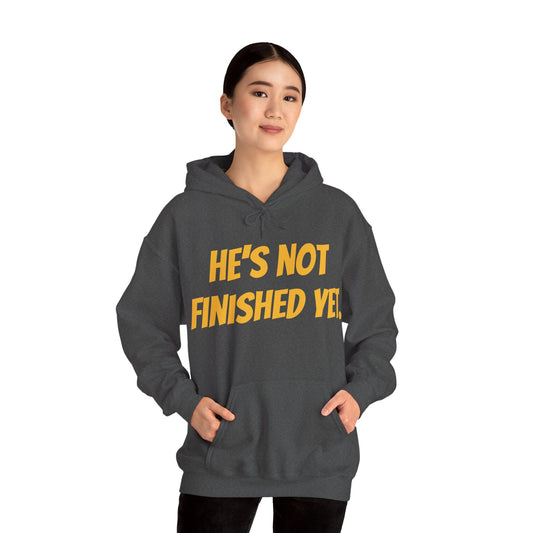 Unisex Heavy Blend Hoodie - "He's Not Finished Yet" Motivational Sweatshirt, Casual Wear, Gift for Him, Inspirational Apparel, Cozy Fashion