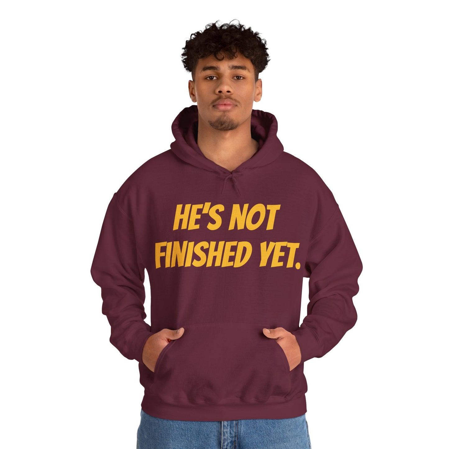 Unisex Heavy Blend Hoodie - "He's Not Finished Yet" Motivational Sweatshirt, Casual Wear, Gift for Him, Inspirational Apparel, Cozy Fashion