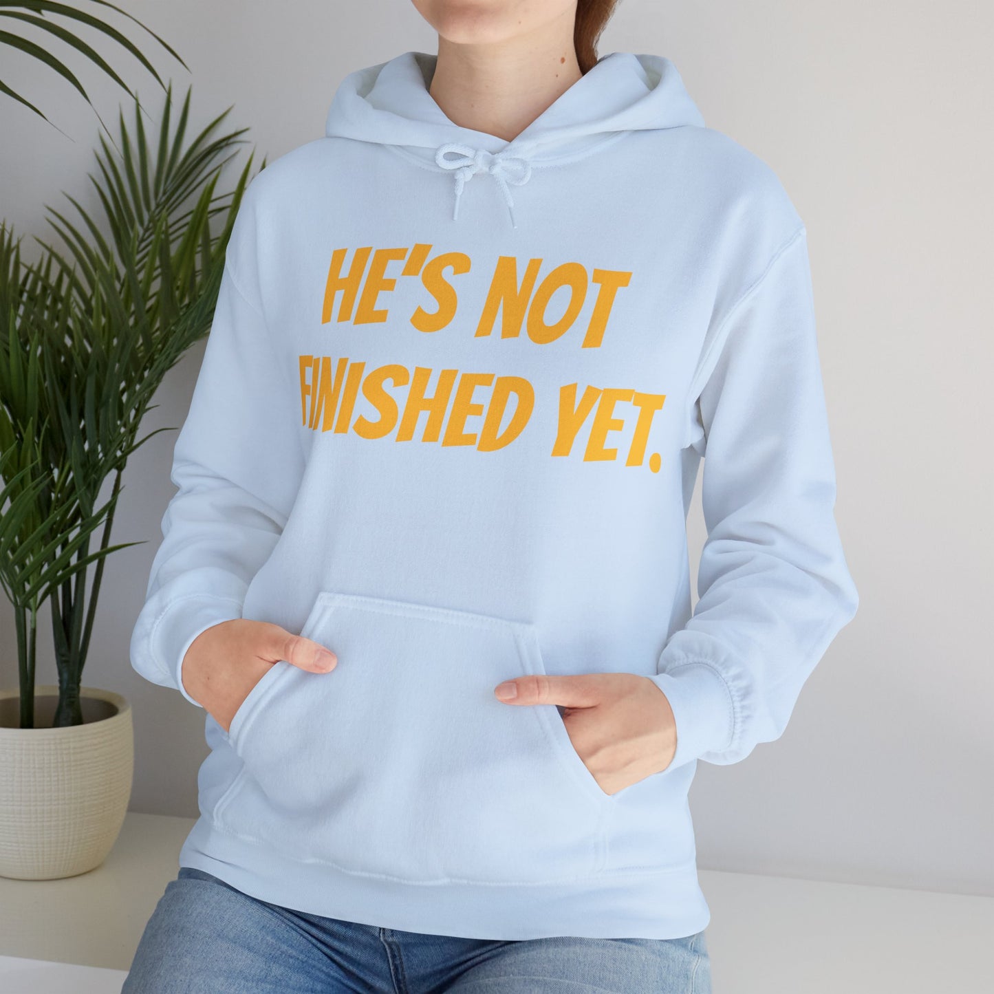 Unisex Heavy Blend Hoodie - "He's Not Finished Yet" Motivational Sweatshirt, Casual Wear, Gift for Him, Inspirational Apparel, Cozy Fashion