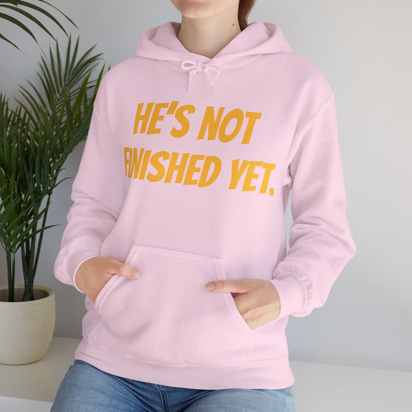 Unisex Heavy Blend Hoodie - "He's Not Finished Yet" Motivational Sweatshirt, Casual Wear, Gift for Him, Inspirational Apparel, Cozy Fashion
