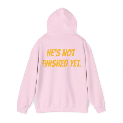 Unisex Heavy Blend Hoodie - "He's Not Finished Yet" Motivational Sweatshirt, Casual Wear, Gift for Him, Inspirational Apparel, Cozy Fashion