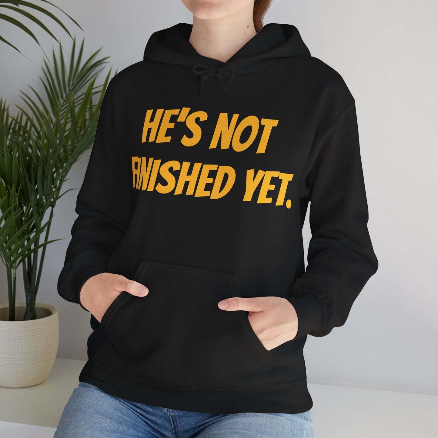 Unisex Heavy Blend Hoodie - "He's Not Finished Yet" Motivational Sweatshirt, Casual Wear, Gift for Him, Inspirational Apparel, Cozy Fashion