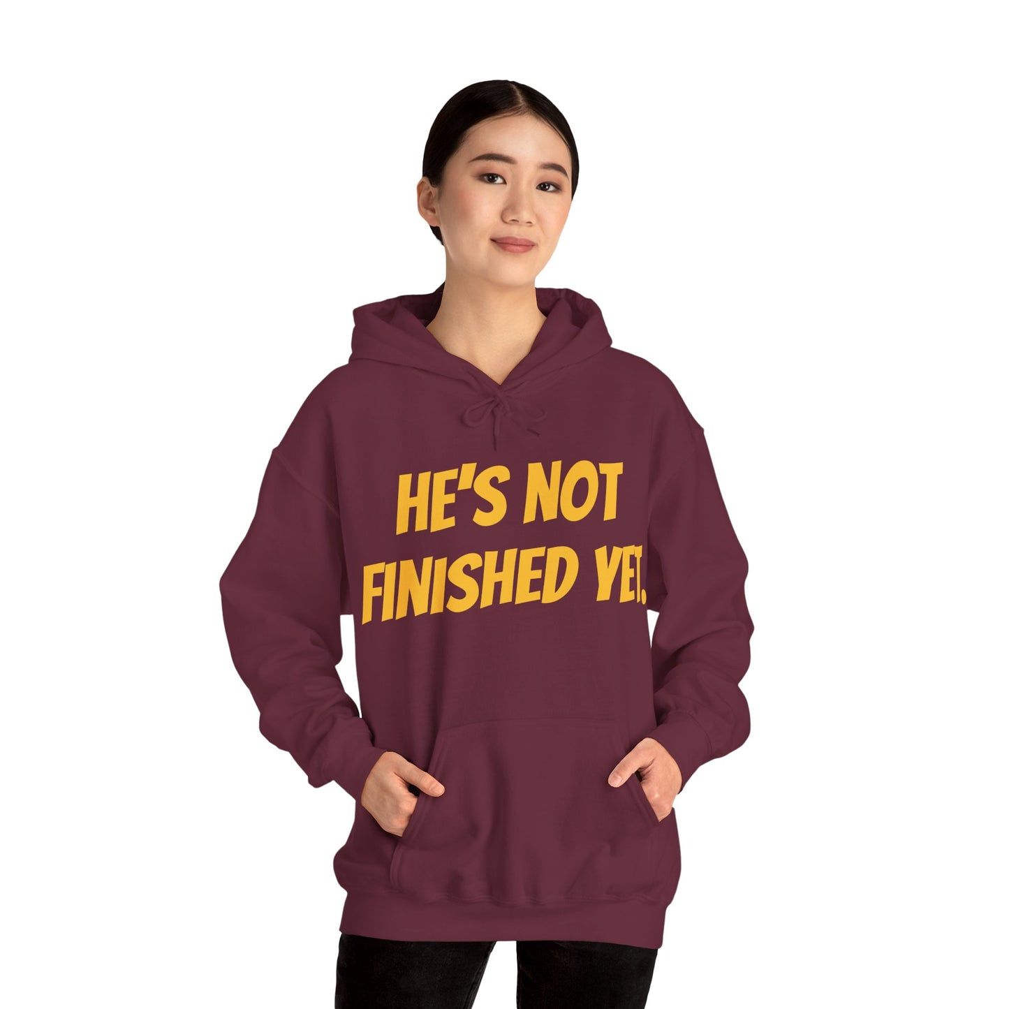 Unisex Heavy Blend Hoodie - "He's Not Finished Yet" Motivational Sweatshirt, Casual Wear, Gift for Him, Inspirational Apparel, Cozy Fashion